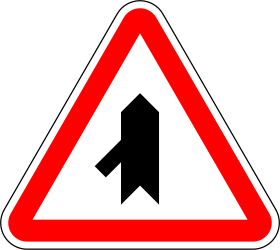 Crossroad with sharp side road on left side