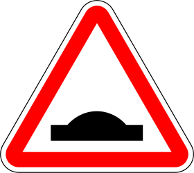 Speed bumps in road
